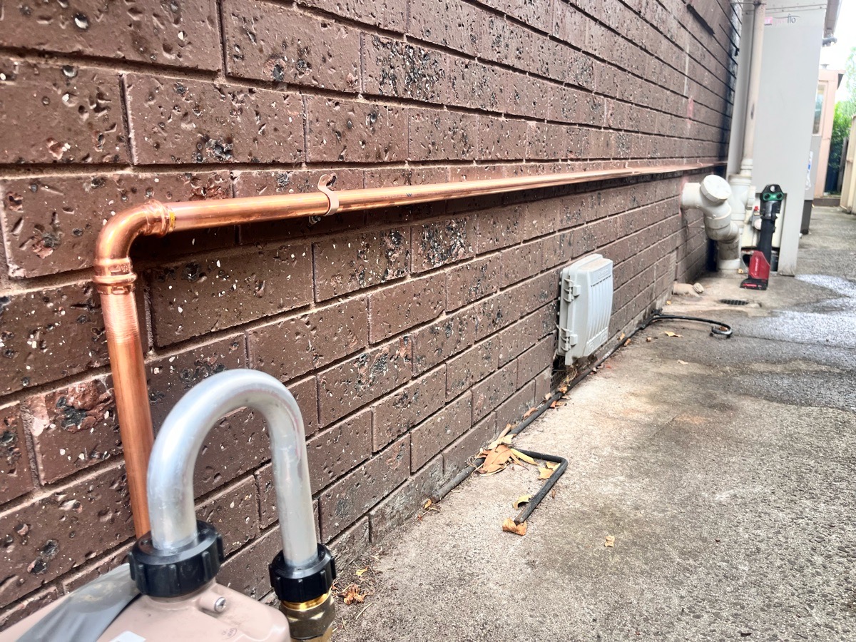 Gas line to hot water service
